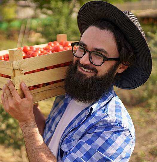 man carrying vagetables